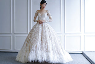 Dazzling Ideas for a Feather Wedding Dress! - Rosymae