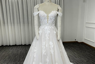 The Ultimate Guide to Wedding Dress Cleaning - Rosymae