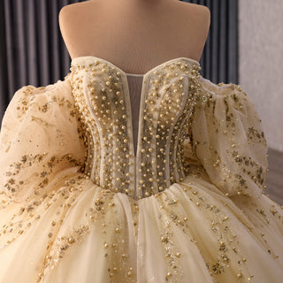 Champagne Quinceañera Ball Gown with Gold Detailing and Detachable Puff Sleeves