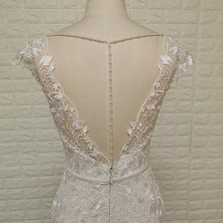 Vestidos de novia de sirena con encaje floral romántico para una novia elegante y entallada