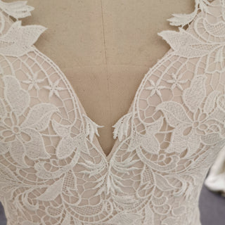 Vestidos de novia de sirena con encaje floral romántico para una novia elegante y entallada