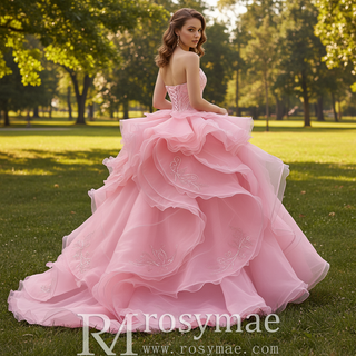 Blushing Pink Ball Gown with Cascading Ruffles and Sequined Lace Bodice