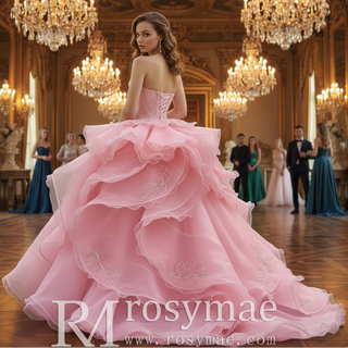 Blushing Pink Ball Gown with Cascading Ruffles and Sequined Lace Bodice