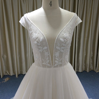 Elegant A-line Flowy Wedding Dress with Cap Sleeve for Beach