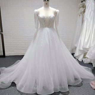 Long Sleeve Sheer Deep Plunge V-Neck Beaded Ball Gown Wedding Dress