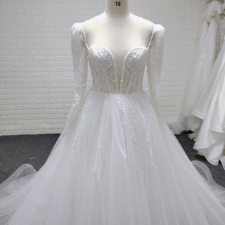 Long Sleeve Sheer Deep Plunge V-Neck Beaded Ball Gown Wedding Dress