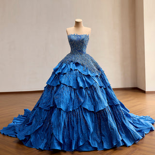Strapless raw-edge neckline with full hand-beaded crystal bodice