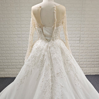 Wedding Dress with Shimmering Vertical Embroidery Meets Lace-Bordered Scalloped Train