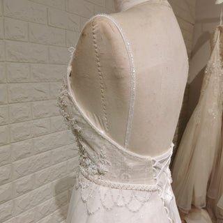 Sexy Backless A-line Wedding Dress with Spaghetti Straps