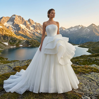 White Strapless Pleated Tulle Ball Gown Wedding Dress with Sculptural Layered Ruffle & Train