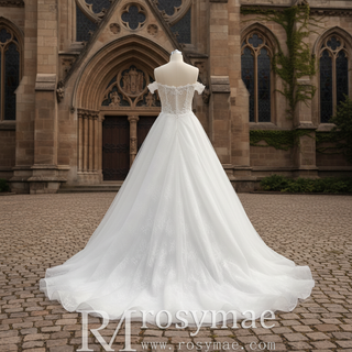 Vestido de novia de corte A con hombros descubiertos, corpiño transparente y cuentas, con flores 3D