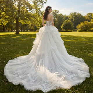 A-line Tulle Ruffle Wedding Dress with Curvy Neckline - Rosymae