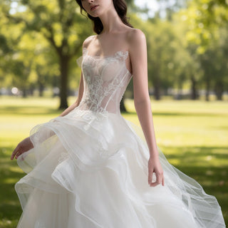 A-line Tulle Ruffle Wedding Dress with Curvy Neckline - Rosymae