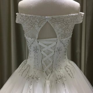 Elegant Ball Gown Wedding Dress with Off-the-Shoulder Neckline and Corset Back - Rosymae
