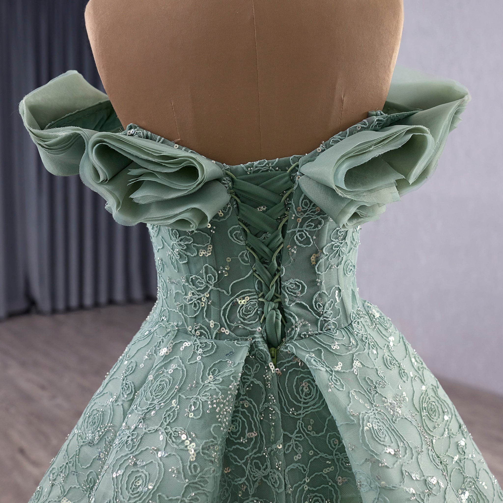 Elegant Sage Green Ball Gown with Off-the-Shoulder Ruffled Neckline & Corset Back - Rosymae