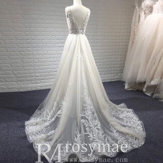 Robe de mariée élégante en dentelle à double décolleté plongeant et bustier transparent