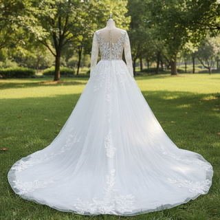 Robe de mariée A-ligne à manches longues et corsage transparent avec tulle scintillant