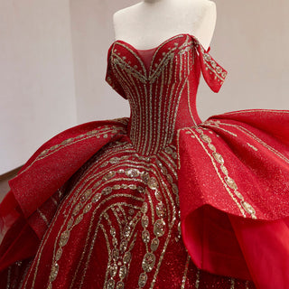 Off-Shoulder Gold Sequin Quinceanera Dress with Ruffled Peplum Oversized Back Bow