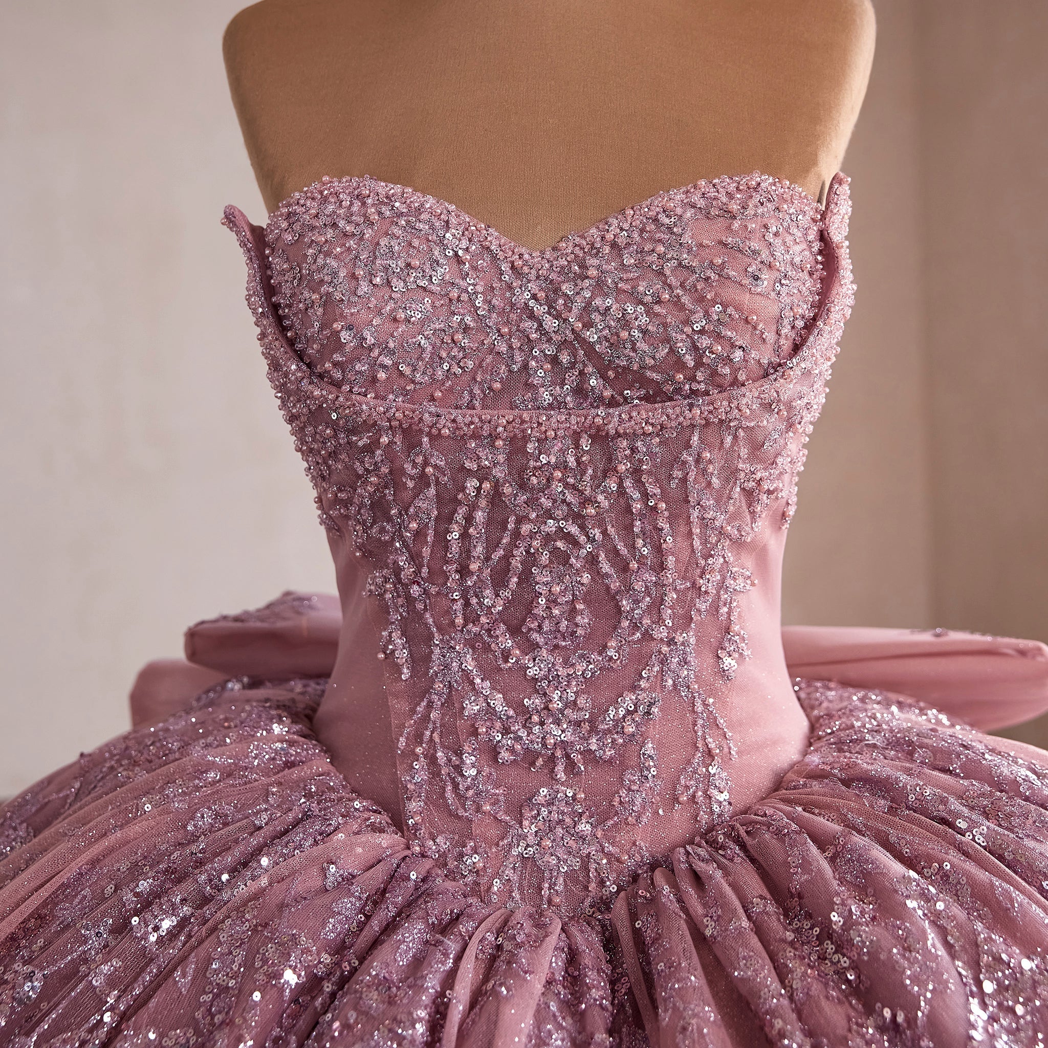 Pink Sparkly Quinceañera Dress with Multi-Layered Back Bow & Voluminous Tiered Ruffles - Rosymae