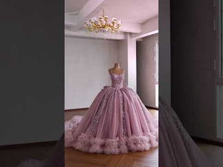 Pink Sparkly Quinceañera Dress with Multi-Layered Back Bow & Voluminous Tiered Ruffles