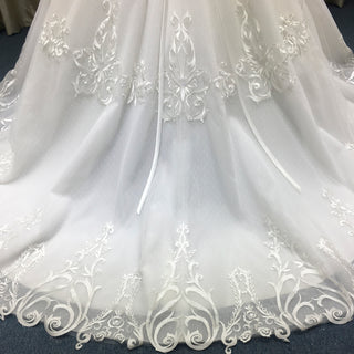 Elegant Floral Lace Ball Gown Wedding Dress with Curved Neckline