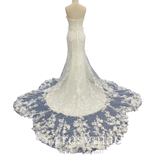 Robe de mariée sirène sans bretelles avec traîne en dentelle en forme de feuille