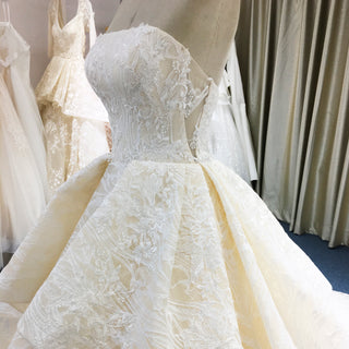 Classic Strapless Ruffle Champagne Wedding Dress with Straight Neck