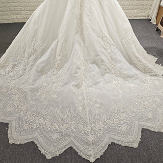 Wedding Dress with Shimmering Vertical Embroidery Meets Lace-Bordered Scalloped Train - Rosymae