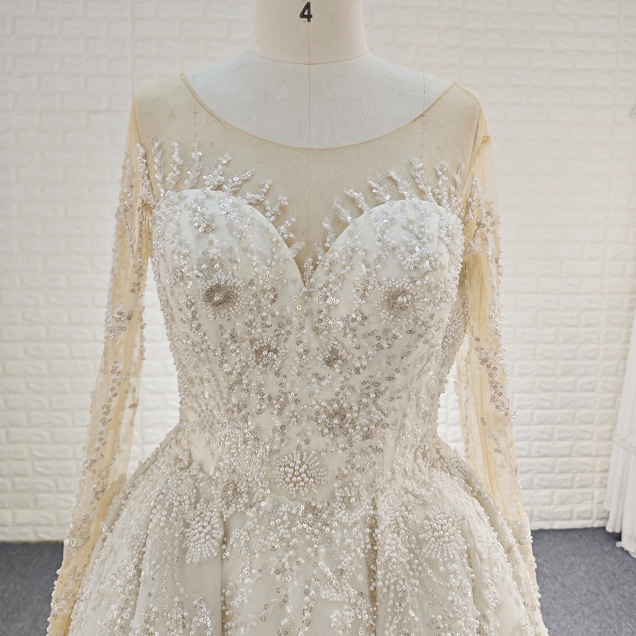 Wedding Dress with Shimmering Vertical Embroidery Meets Lace-Bordered Scalloped Train - Rosymae