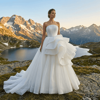 White Strapless Pleated Tulle Ball Gown Wedding Dress with Sculptural Layered Ruffle & Train