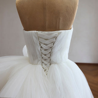 White Strapless Pleated Tulle Ball Gown Wedding Dress with Sculptural Layered Ruffle & Train