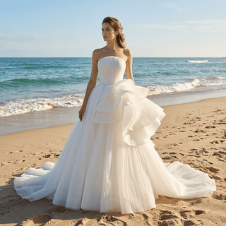 White Strapless Pleated Tulle Ball Gown Wedding Dress with Sculptural Layered Ruffle & Train
