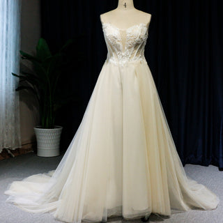 Vestido de novia de primavera clásico sin tirantes con escote redondo y línea A