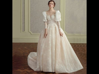 Sheer Front Ball Gown Wedding Dress With Long Lantern Sleeves
