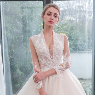 plunging-neckline-wedding-dress-with-sleeves