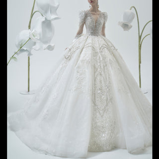 Puffy Sheer Long Sleeve Ball Gown Wedding Dress with Sparkly Crystals